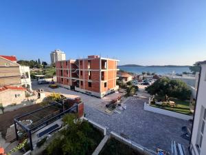 an aerial view of a building in a city at Apartment Danijela in Vodice