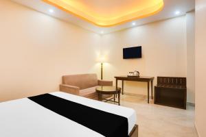 Μια τηλεόραση ή/και κέντρο ψυχαγωγίας στο Hotel O THE MAJESTIC INN