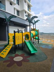 a playground on the roof of a building at Vista Bangi Muji-styled 3BR Sunrise view in Kajang