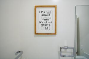 a framed picture on a wall in a bathroom at Cozy Downtown London 1BR Gem in London +8 photos