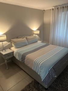 Katil atau katil-katil dalam bilik di Cozy and convenient