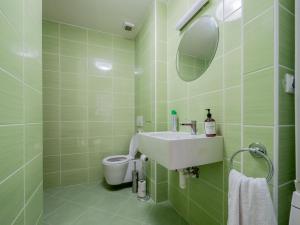 Et badeværelse på Gorgeous apartment in center