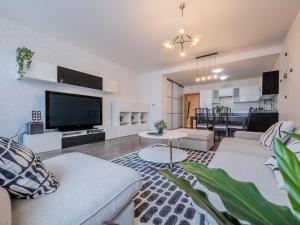 Et tv og/eller underholdning på Gorgeous apartment in center