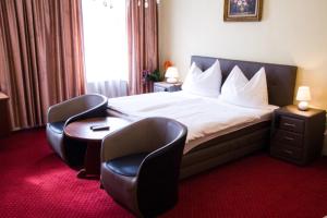 Letto o letti in una camera di Hotel Alter Telegraf