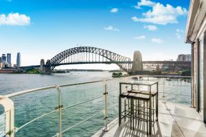 a view of the sydney harbour bridge from a cruise ship at Transcending Views in Sydney