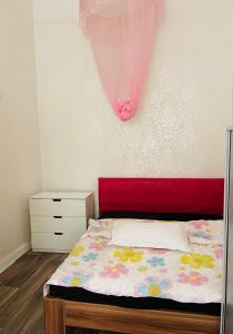 Postel nebo postele na pokoji v ubytování New Easy Home