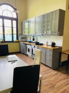 Kuchyň nebo kuchyňský kout v ubytování New Easy Home