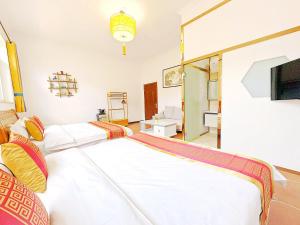 Krevet ili kreveti u jedinici u okviru objekta Beijing Great Wall Shiguang Homestay