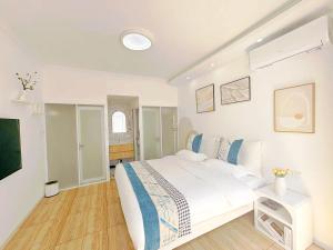 Krevet ili kreveti u jedinici u okviru objekta Beijing Great Wall Shiguang Homestay