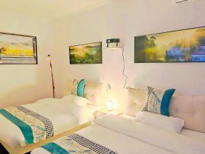 Krevet ili kreveti u jedinici u okviru objekta Beijing Great Wall Shiguang Homestay