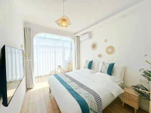 Krevet ili kreveti u jedinici u okviru objekta Beijing Great Wall Shiguang Homestay