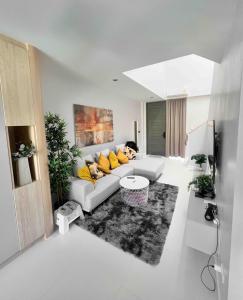 Postel nebo postele na pokoji v ubytování TownHouse4 2BR MonkeyHill