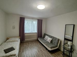 Ένα ή περισσότερα κρεβάτια σε δωμάτιο στο Ubytování v rodinném domě