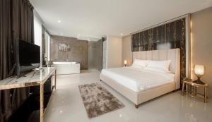 Voodi või voodid majutusasutuse The Valen Resort toas