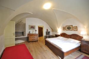 Postel nebo postele na pokoji v ubytování Latrán 43 apartments