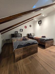 Postel nebo postele na pokoji v ubytování Apartments Angir