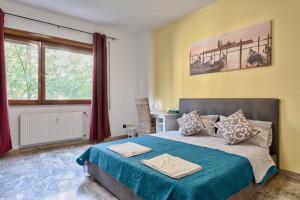 Postel nebo postele na pokoji v ubytování Bellavista Palladio