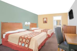 Voodi või voodid majutusasutuse Super 8 by Wyndham St. George UT toas