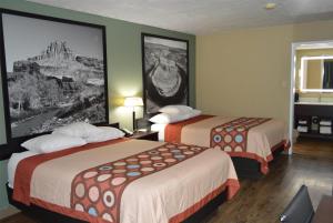 Voodi või voodid majutusasutuse Super 8 by Wyndham St. George UT toas
