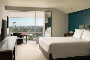 a hotel room with a bed and a view at Andaz West Hollywood, By Hyatt in Los Angeles