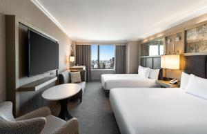 Postel nebo postele na pokoji v ubytování Hyatt Regency Boston