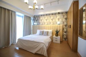 Postel nebo postele na pokoji v ubytování Cylo's Place Manhattan + 97 fotografií