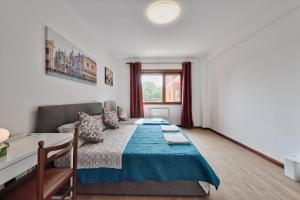 Postel nebo postele na pokoji v ubytování Bellavista Palladio