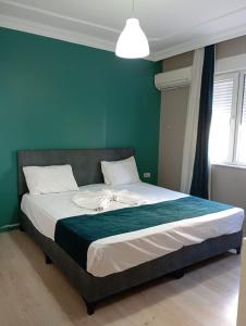 Postel nebo postele na pokoji v ubytování KHAN's B&B HOTEL