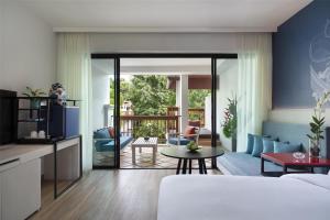 Ein Bett oder Betten in einem Zimmer der Unterkunft Avani Plus Koh Lanta Krabi Resort