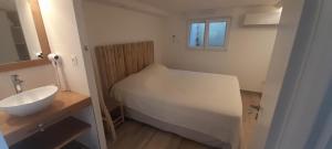 Ένα ή περισσότερα κρεβάτια σε δωμάτιο στο Appartements et villa BEGUDE +69 φωτογραφίες