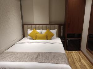 Postel nebo postele na pokoji v ubytování Hotel Flexi Residency Mumbai