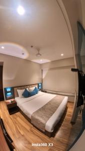 Postel nebo postele na pokoji v ubytování Hotel Flexi Residency Mumbai