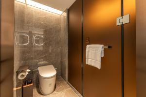 ECHENG Hotel, Jianghan Road Pedestrian Street, Wuhan River Beach的一间浴室