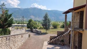 a view of a mountain from a house at COUNTRY PLACE Apartment with Mountain View in Ioannina