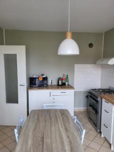 Η κουζίνα ή μικρή κουζίνα στο Maison individuelle +8 φωτογραφίες