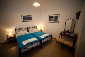 Giường trong phòng chung tại Casaprimavera