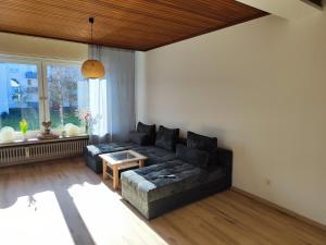 Posezení v ubytování Gemütliche Wohnung mit großer Dachterrasse in sehr zentraler Lage