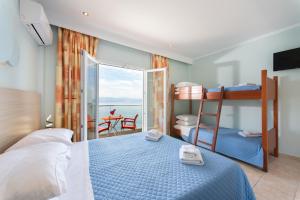 Postel nebo postele na pokoji v ubytování Corfu Maris + 37 fotografií