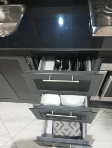 Kuchyň nebo kuchyňský kout v ubytování Appartement Alhoceima