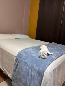 Postel nebo postele na pokoji v ubytování La Lima Park Hotel