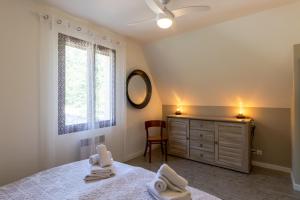 Ένα ή περισσότερα κρεβάτια σε δωμάτιο στο Maison Fleurie +18 φωτογραφίες