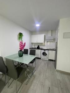 Køkken eller tekøkken på Viana Rooms Córdoba