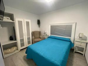 En eller flere senge i et værelse på Viana Rooms Córdoba