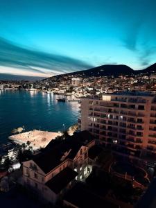 a view of a city and a body of water at Azure Escape luxury apartments Sarande in Sarandë