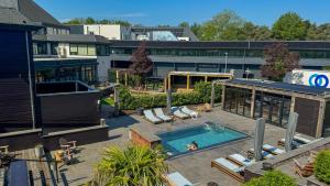 Bazén v ubytování Van der Valk Hotel Gilze-Tilburg nebo v jeho okolí