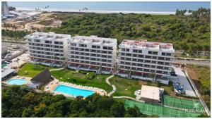 an aerial view of a resort with a swimming pool at Departamento TerraMar Flamingos in Nuevo Vallarta