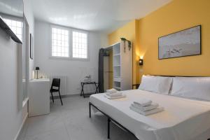 Postel nebo postele na pokoji v ubytování AMINA Guest House