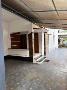 an empty building with stairs in a building at Yatri Haven Varkala in Varkala