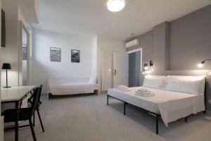 Postel nebo postele na pokoji v ubytování AMINA Guest House