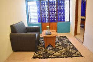 Posezení v ubytování Aishwaryam home stay